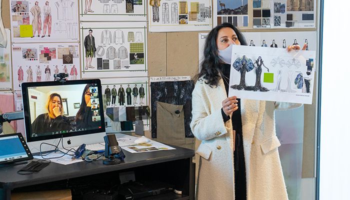 Fashion Design faculty Mitra Rajabi during a Zoom fitting with students and mentors. Photo by Andre Hylton