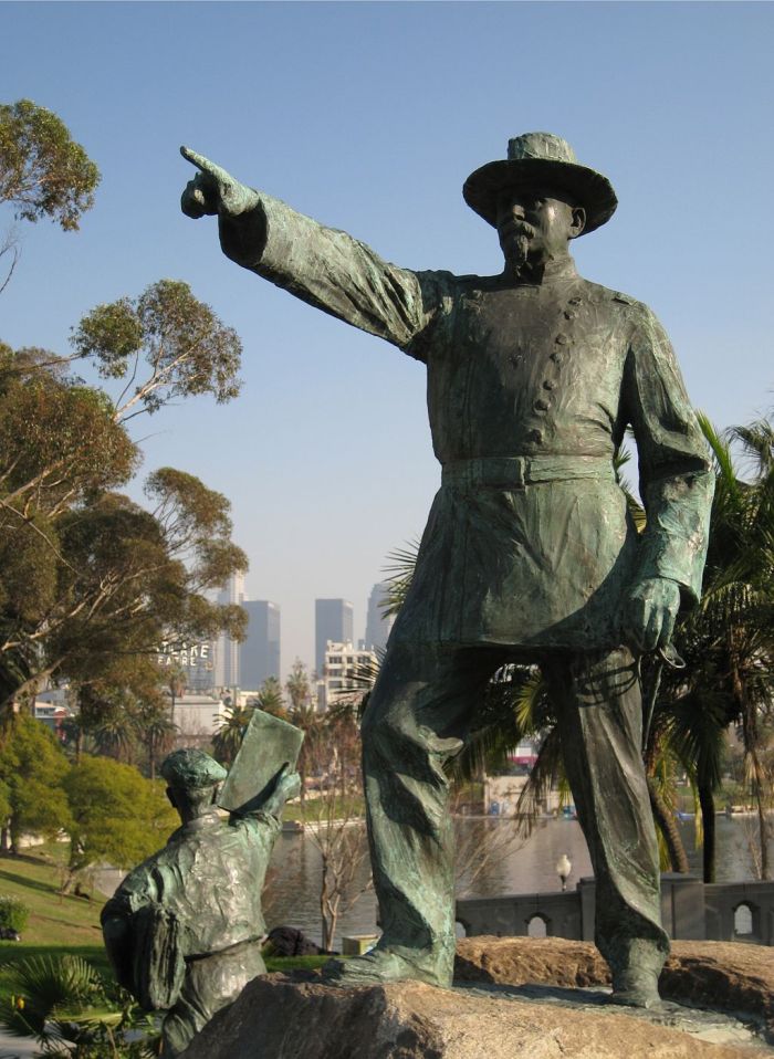 A statue of Harrison Gray Otis in MacArthur Park that points to the site of his former home and Otis College's first campus.