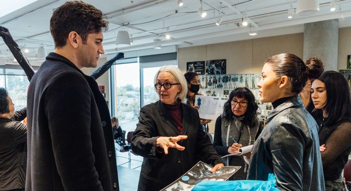 Activision Art Director Tim McGrath, left, with Activision Costume Designer Louise Mingenbach during a mentorship session with Otis College Fashion Design students