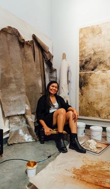 Otis College MFA Fine Arts student works in their studio